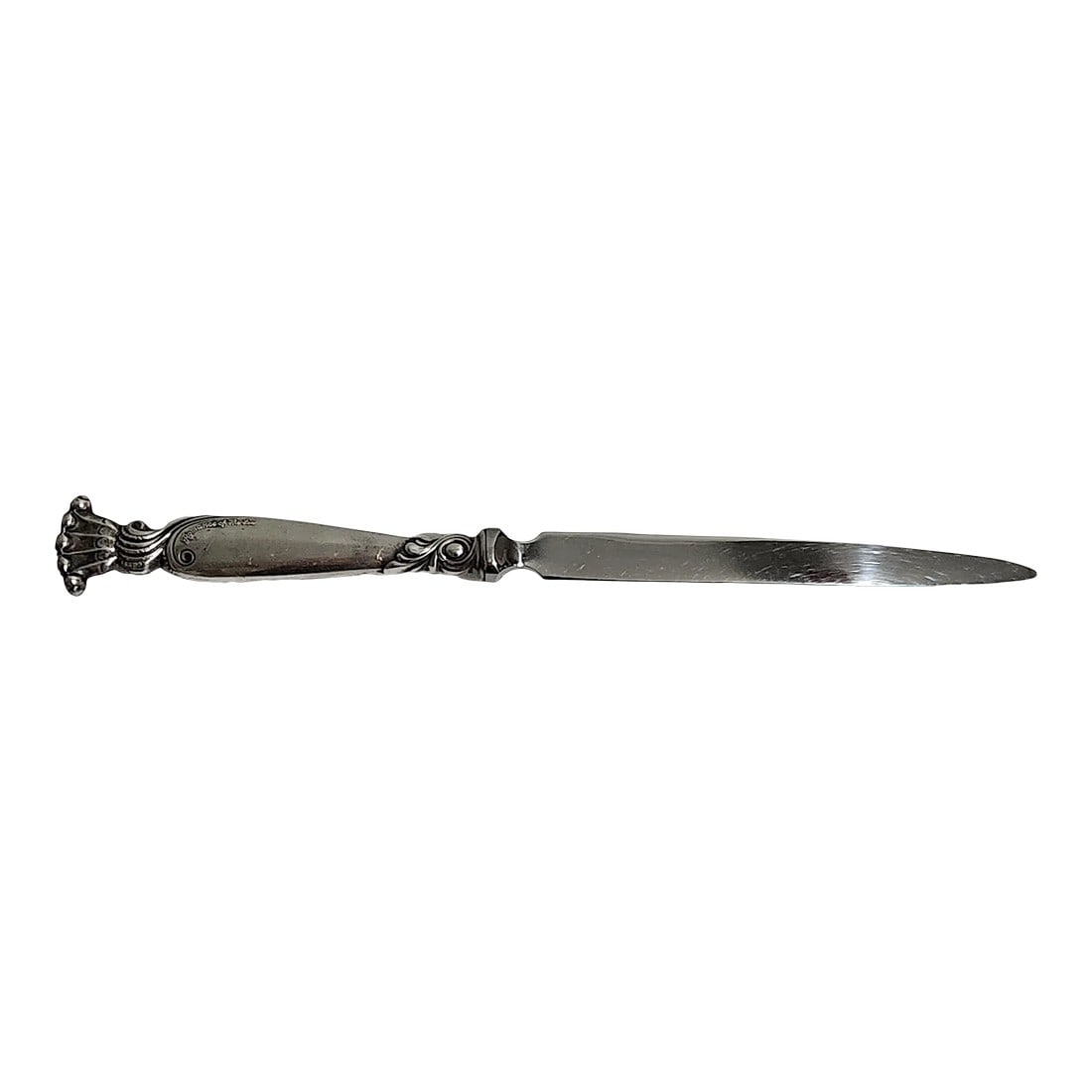 Vintage Romance of the Sea Sterling Silver Letter Opener: Sterling silver handle letter opener. An exquisite desk accessory. Coastal theme in design. Slim blade with sharp point. Marked Sterling Handle with a raised prominent, cursive inscription "Romance of