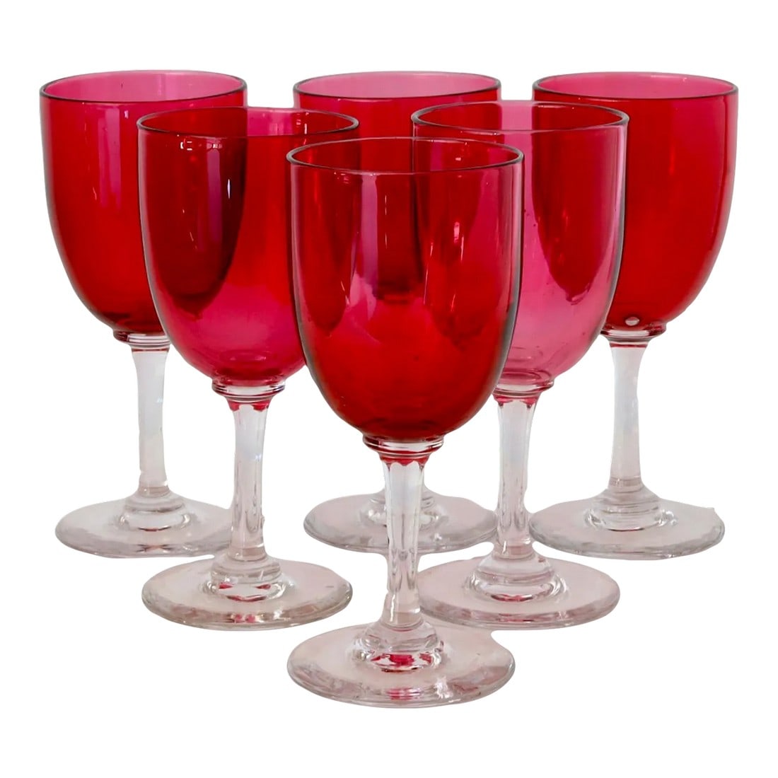 19th-Century English Victorian Hand-Blown Cranberry Wine / Cocktail Stems: If Lady Whistledown hosted a cocktail party, these would be on the tray. A radiant set of six Victorian cranberry glass goblets with hand-blown clarity and a dash of drama, each holds about