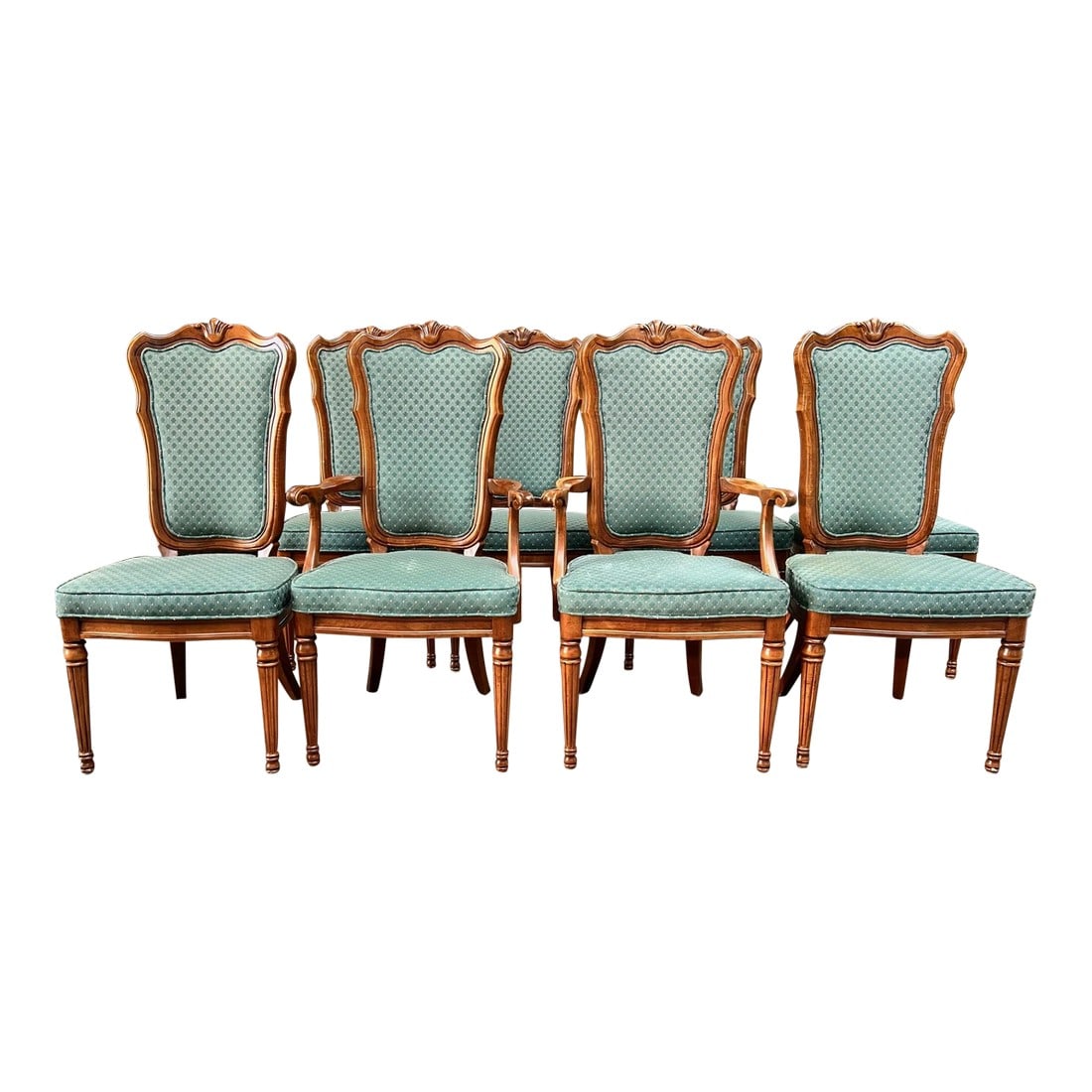 1980s White Furniture Co. Green Dining Chairs - Set of 8: Introducing 8 White Furniture Co. Dining chairs. Two captain chairs and 6 side chairs. Fluted legs and embellishment on the back rest. The fabric is durable and can be replaced or kept as is. There's