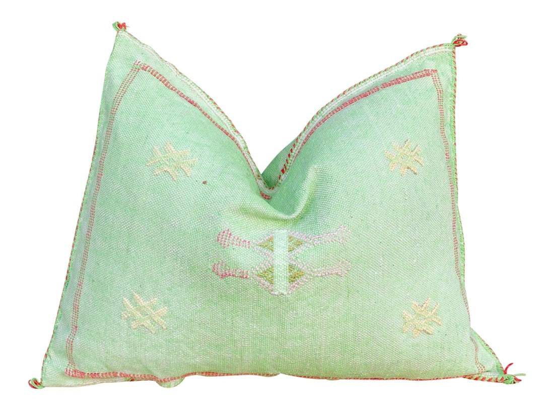 Ella Lumbar Moroccan Silk Rug Pillow: This gorgeous pillow is entirely hand-woven from silk that comes from a Sabra cactus plant. Every pillow is beautifully embroidered with a unique tribal motif that varies from every other pillow.