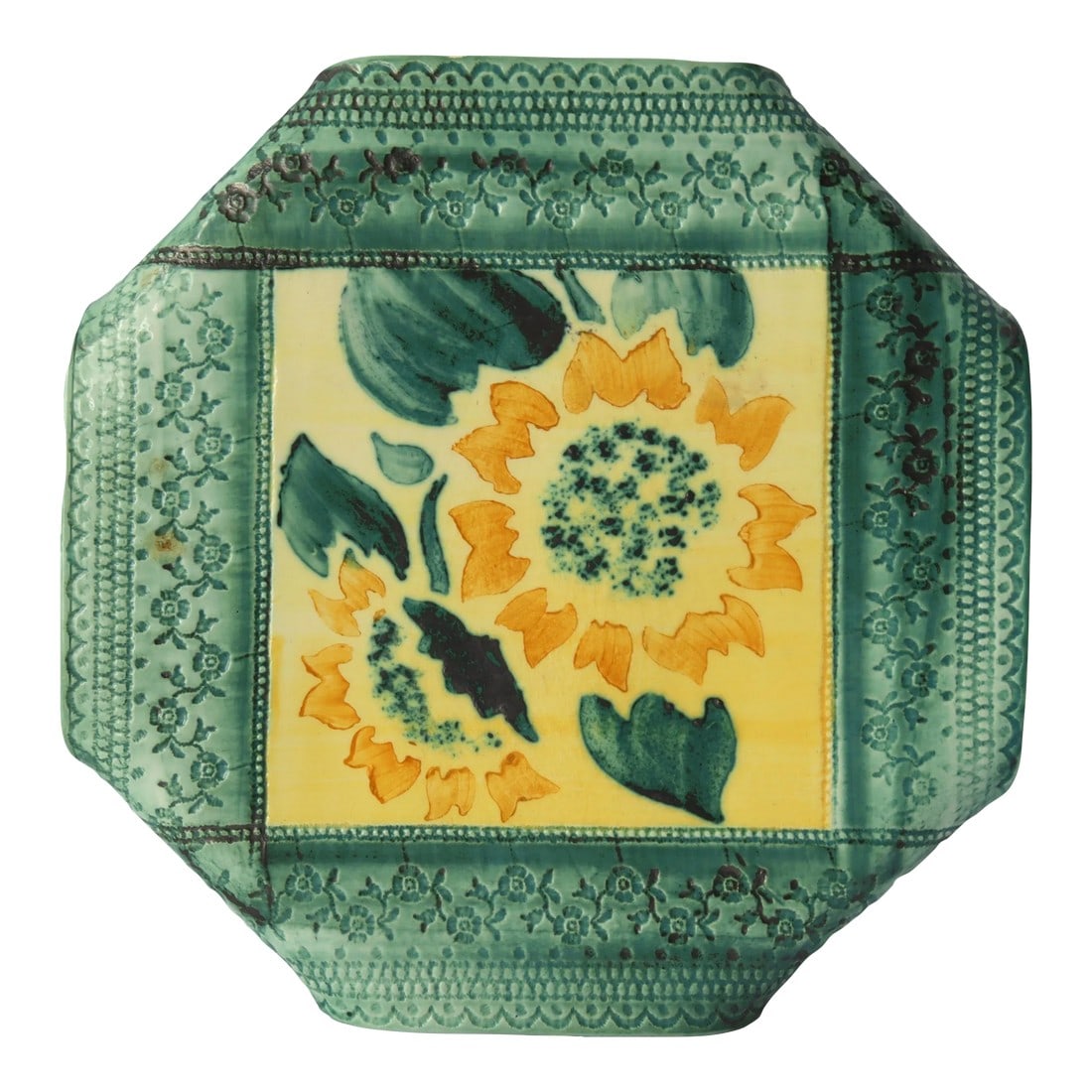 French Hand-Made Majolica Trivet: Add a touch of French charm to your kitchen with this hand-made majolica trivet, perfect for slicing bread or serving charcuterie. It is uniquely crafted by pressing lace into the clay, creating a