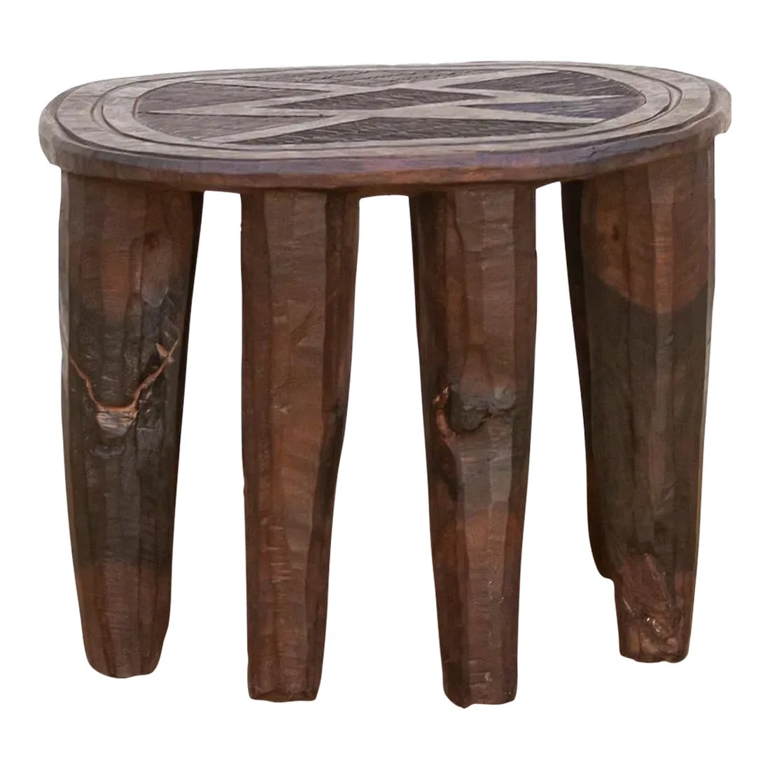 Egan Nupe Rustic African Stool: A unique piece of African art, this vintage Nupe table from Nigeria is a must-have for collectors and enthusiasts of Nupe culture. Carved from a single log of wood and standing on 8 chunky tapered leg