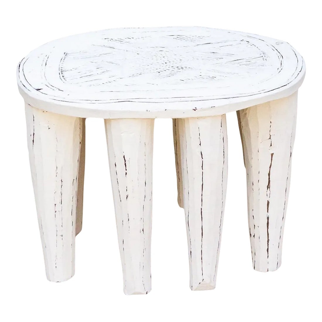 Artisanal White Carved Nupe Coffee Table: A unique piece of African art, this vintage Nupe table from Nigeria is a must-have for collectors and enthusiasts of Nupe culture. Carved from a single log of wood and standing on 8 chunky tapered leg