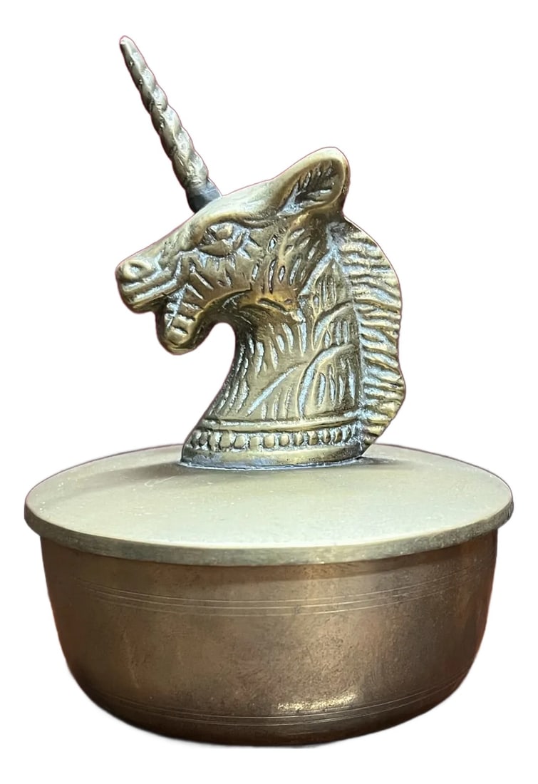 Vintage Brass Unicorn Box: Vintage brass round lidded dish. The top cover is a unicorn head. Made from n Korea. This could be used as a lidded candy dish or trinket box. Condition: Alterations: Original Condition Unaltered Impe