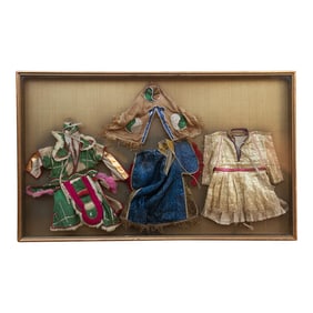 Framed Collection of Antique Children's Robes
