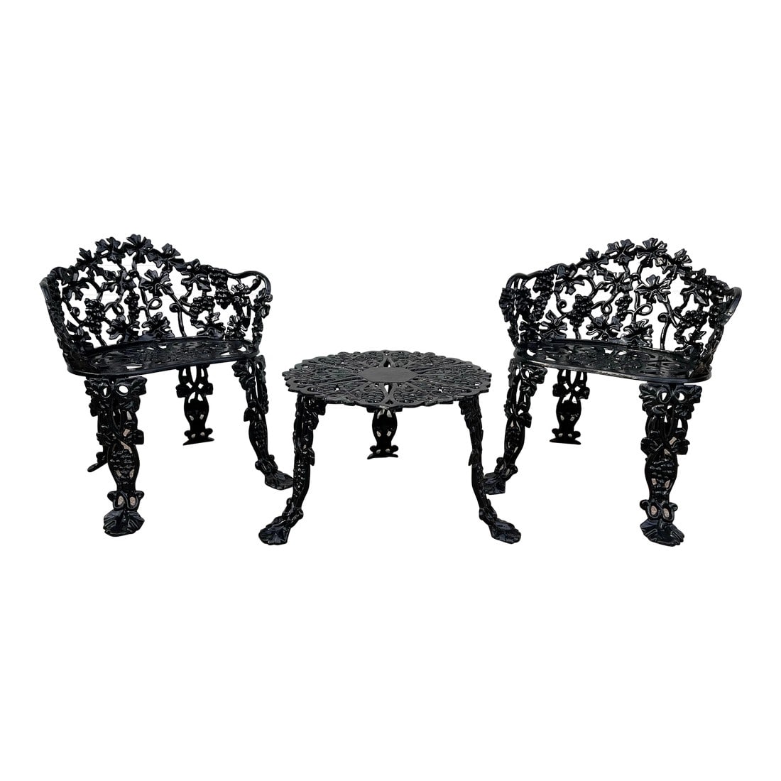 Cast Iron Victorian Garden Table and Chairs - Set of 3: Antique garden dining set of 3 including a low table and two chairs. This garden table and chairs set is ideal for drinks or snacks and is made entirely of cast iron from the early to mid 1900s. Featu