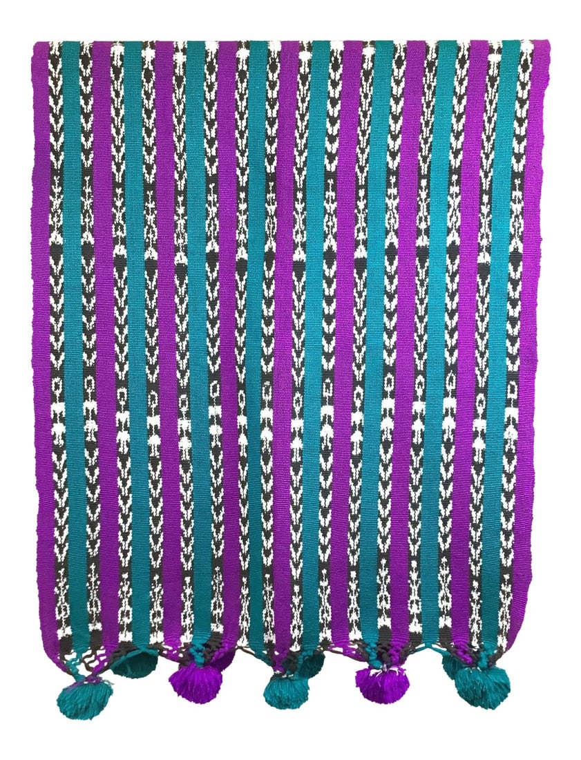 Peruvian Wool Cotton Tasseled Throw: The colors are magnificent. These tones are trending now. Add a beautiful splash of color and add some vintage style to your room. Handwoven and one of a kind. Use this as a throw or a table cover. 