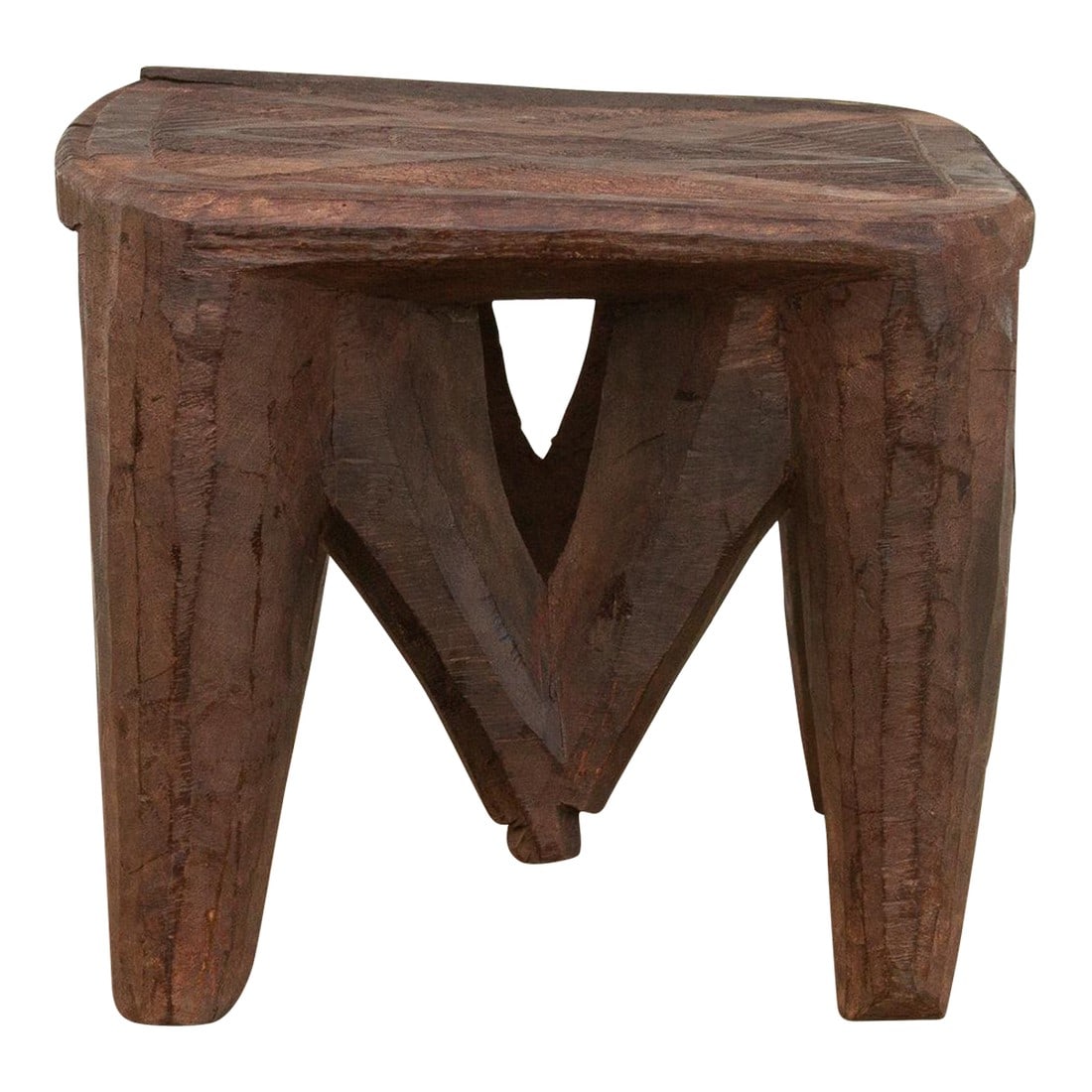 Vintage Market Day Carved Stool: A unique piece of African art, this vintage Nupe table from Nigeria is a must-have for collectors and enthusiasts of Nupe culture. Carved from a single log of wood and standing on 4 chunky tapered
