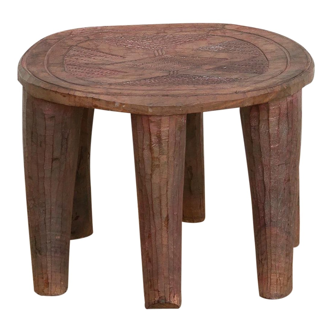 Carved Vintage Nupe End Table: A unique piece of African art, this vintage Nupe table from Nigeria is a must-have for collectors and enthusiasts of Nupe culture. Carved from a single log of wood and standing on 6 chunky tapered leg