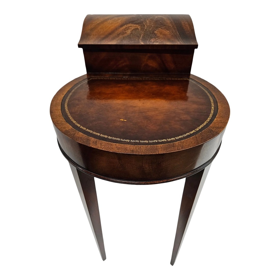Mahogany Leather Top Weiman Side Table: A mahogany and leather-top side table is by Weiman and features a partitioned and lidded storage area. The lid is on hinges. Use this piece as a side table or it would serve as a nice bedside