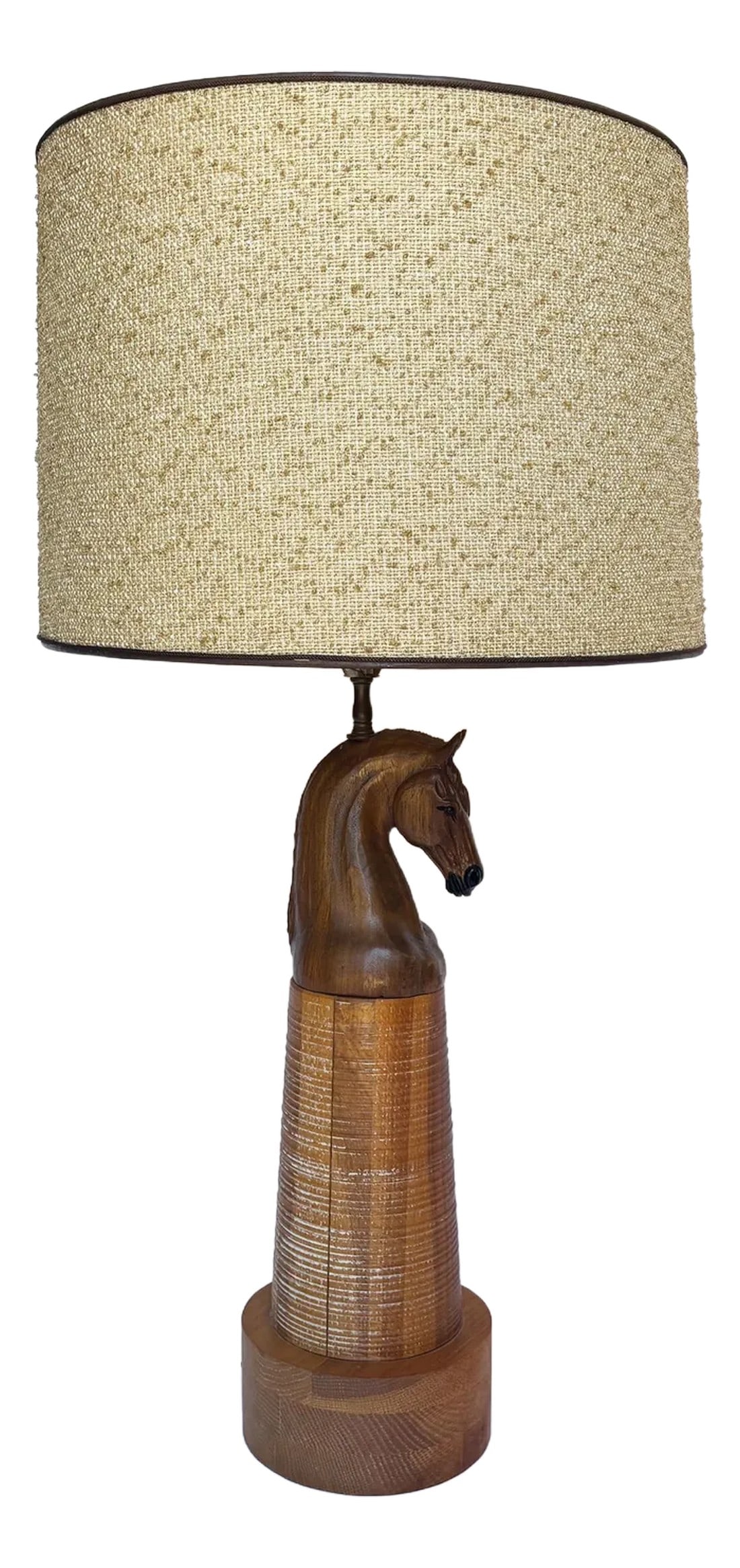 1950s Vintage A. Brandt Ranch Oak Equestrian Carved Horse Table Lamp: Here is a vintage 1950s carved wood horse lamp designed by August Brandt for Ranch Oak Furniture Co. complete with an original shade. This piece adds texture to a space with its original burlap shade