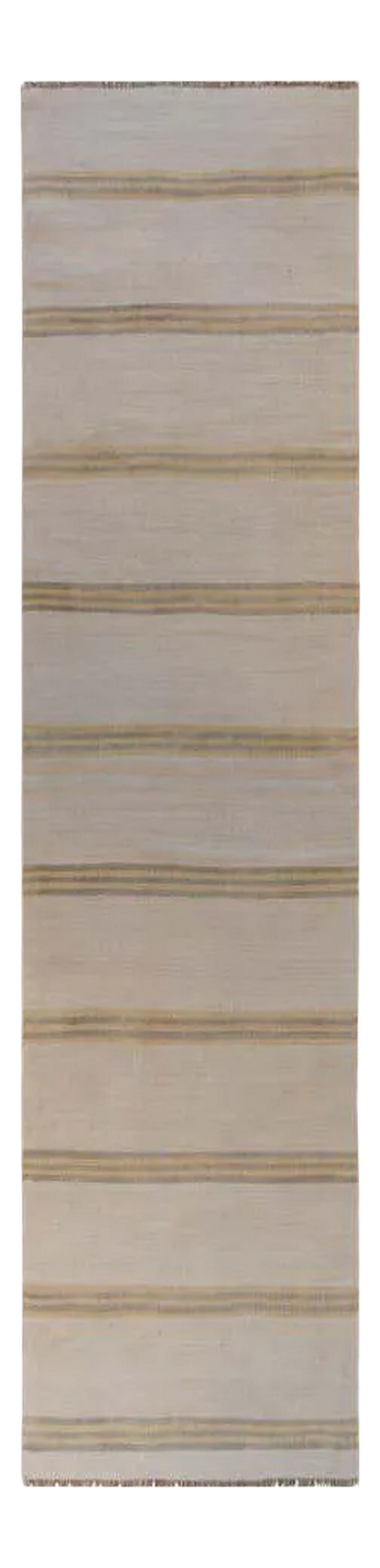 Turkish Kilim Runner: A striking vintage mid-20th century Turkish Konya Kilim runner with a gold and gray striped pattern on a cream colored background. Condition: Alterations: Unknown Imperfections: Some Imperfections
