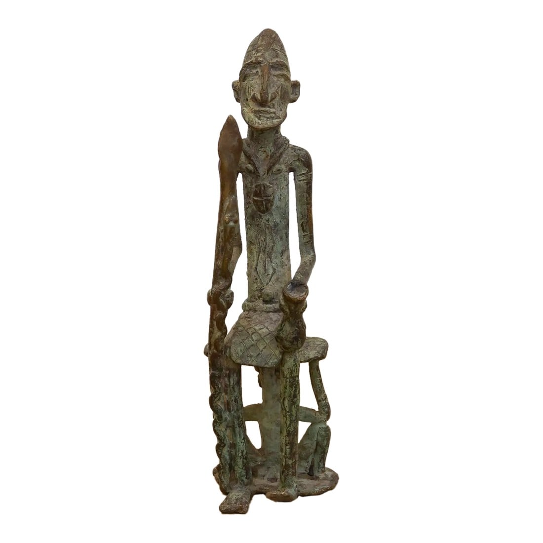 Authentic Antique Dogon Bronze Figure: Invite the ancient spirit of the Dogon people of Mali into your space with this captivating antique bronze figure. Standing at 9.5 inches tall, this sculpture embodies the distinctive artistry and