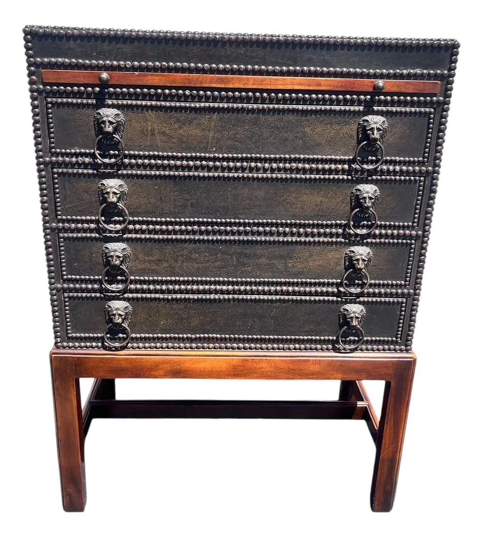 1990s In the Style of Theodore Alexander Campaign Chest of Drawers on Stand With Slip Serving Tray: Gorgeous in the Style of Theodore Alexander, leather studded Campaign Chest Regency Style with three slip brown leather serving / writing trays. In great condition no makers mark. Condition: