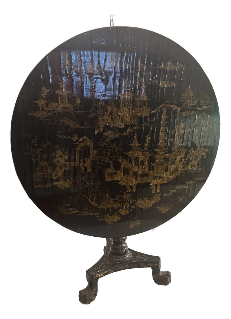 Early 19th Century English Chinoisoerie Tilt Top Round Table. Black and Gold: Extremely well made with very unusual and well executed claw feet. Handmade of solid wood and decorated in black and gold chinoiserie lacquer. Condition: Alterations: Original Condition Unaltered Impe