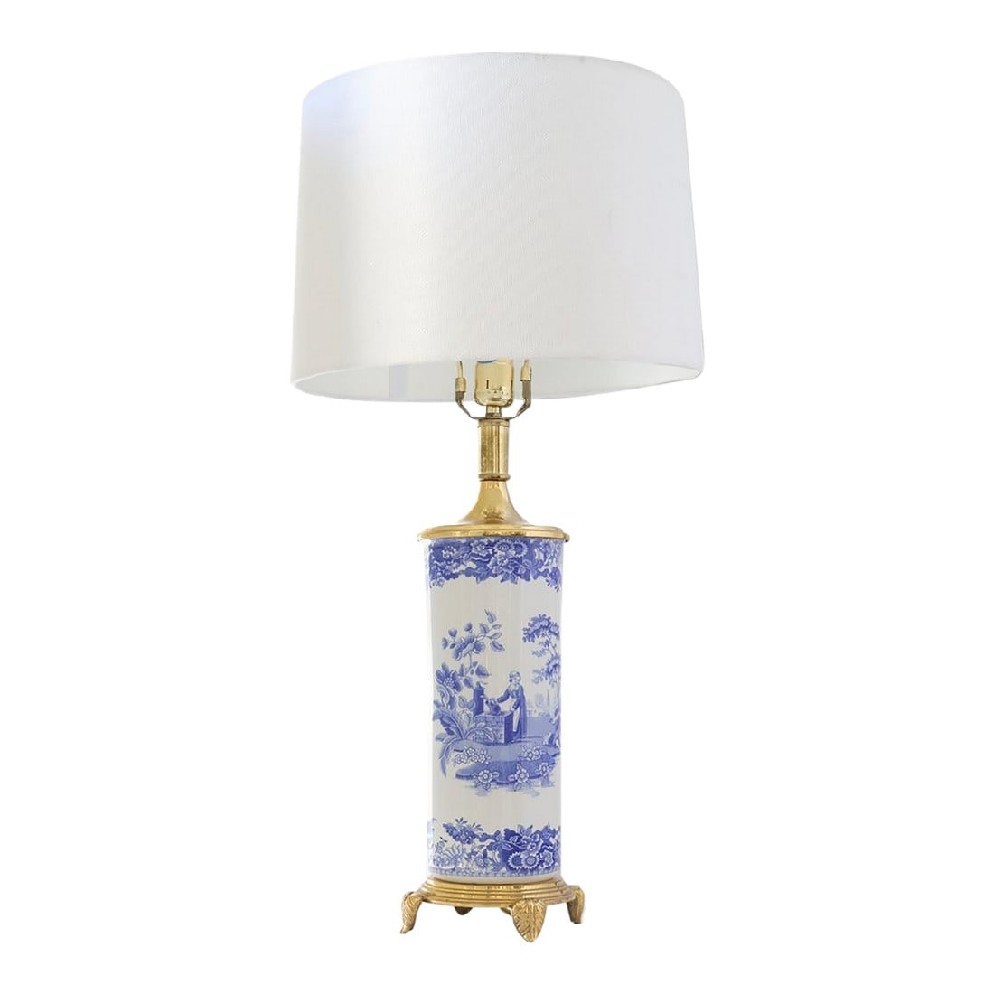 Spode Blue Room Collection Lamp: Classic Spode Blue Room Collection porcelain table lamp featuring a pastoral transferware scene in cobalt on white. Mounted on a heavy brass base with paw feet and decorative gallery trim. Topped
