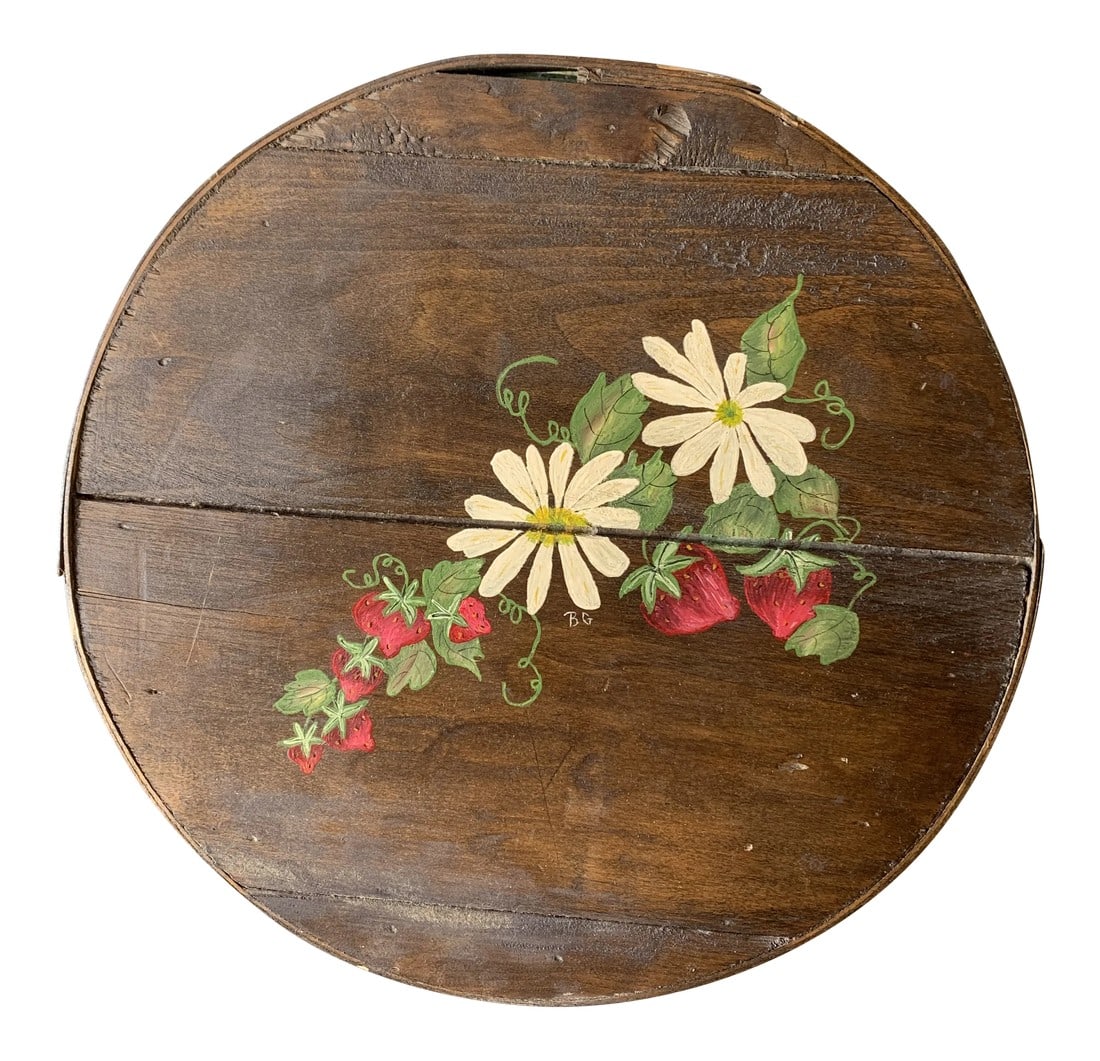 Vintage Round Cheese Box With Fabric Skirt Signed: Vintage round wood cheese box painted with flowers and signed BG . This also is lined in green fabric with ruffle skirt. Measures 15" in diameter and stands 6" high. Condition: Alterations: