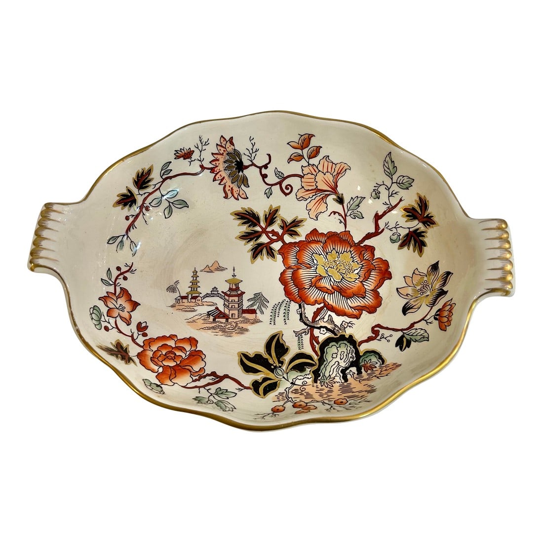 Early 20th Century Masons Ironstone "Golden Azalea" Chinoiserie Oval Serve Bowl With Handles: Golden Azalea is a chinoiserie pattern by Masons produced in the early 20th century. Made of ironstone in England, the pattern features a pagoda and bridge and graceful florals. The rim and handles