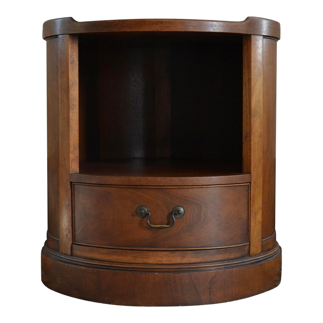 Mid Century Milling Road by Baker Round End Table With Drawer: Great side table by Baker / Milling Road. Style, scale, and functionality are universal with open shelf for display and drawer. Has original maker and seller mark. Walnut grain is beautiful. The top s