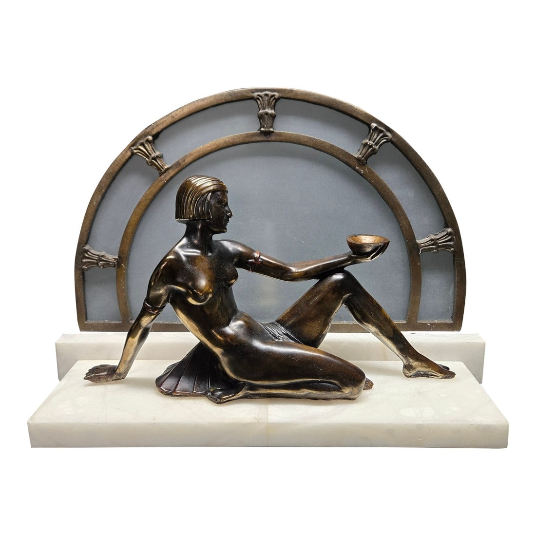 1920s Art Deco Egyptian Revival Nude Spelter & Marble Table Lamp: This Art Deco or Egyptian Revival style lamp features a nude woman reclining with a bowl held in her outstretched hand and cloth wound around her waist. She rests atop a marble plinth consisting of
