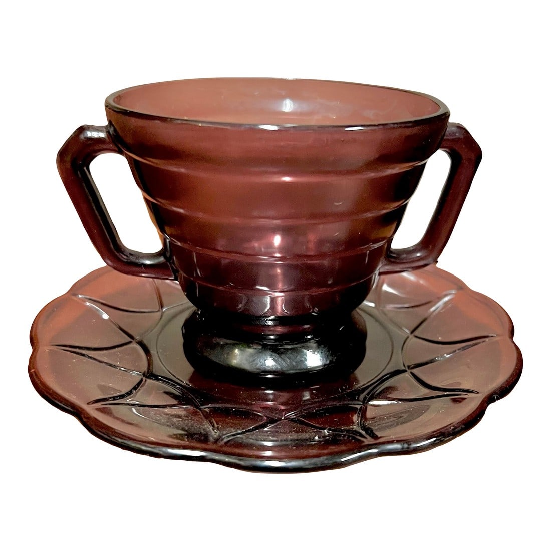 1930s Purple Amethyst Glass Open Sugar Cup With Plate: 1930s Depression Glass. Open Sugar cup with saucer. These are made Hazel-Atlas. * 1930s Footed Open Sugar Amethyst Purple Ribbed Moderntone Hazel Atlas Amethyst Glass with 2 handle. Cup is 3 inches