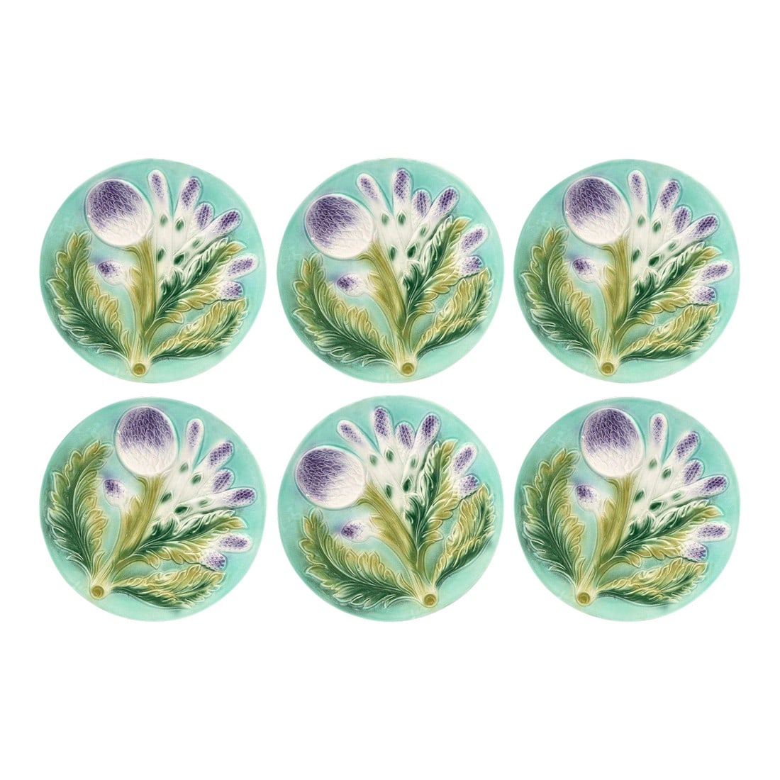 Midcentury Asparagus & Artichoke Plates, Set of Six: A vibrant set of six majolica plates featuring relief-molded artichokes and asparagus sprays in lavender and green against a turquoise ground. Likely produced in Caldas da Rainha, Portugal,