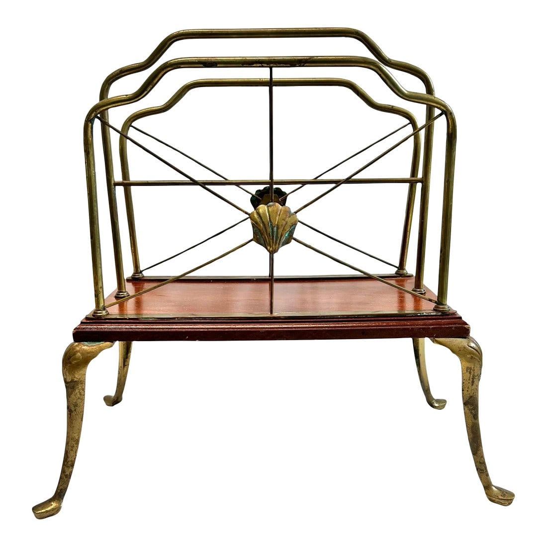 Hollywood Regency Brass Clam Shell Scallop Magazine Rack: A gorgeous vintage brass magazine rack with beautiful lines and detail. It is a stunning piece. Dimensions: 19" tall 18.25" wide (at feet) 15" wide (wood platform) 9.75" deep (at feet) 7.75" (wood