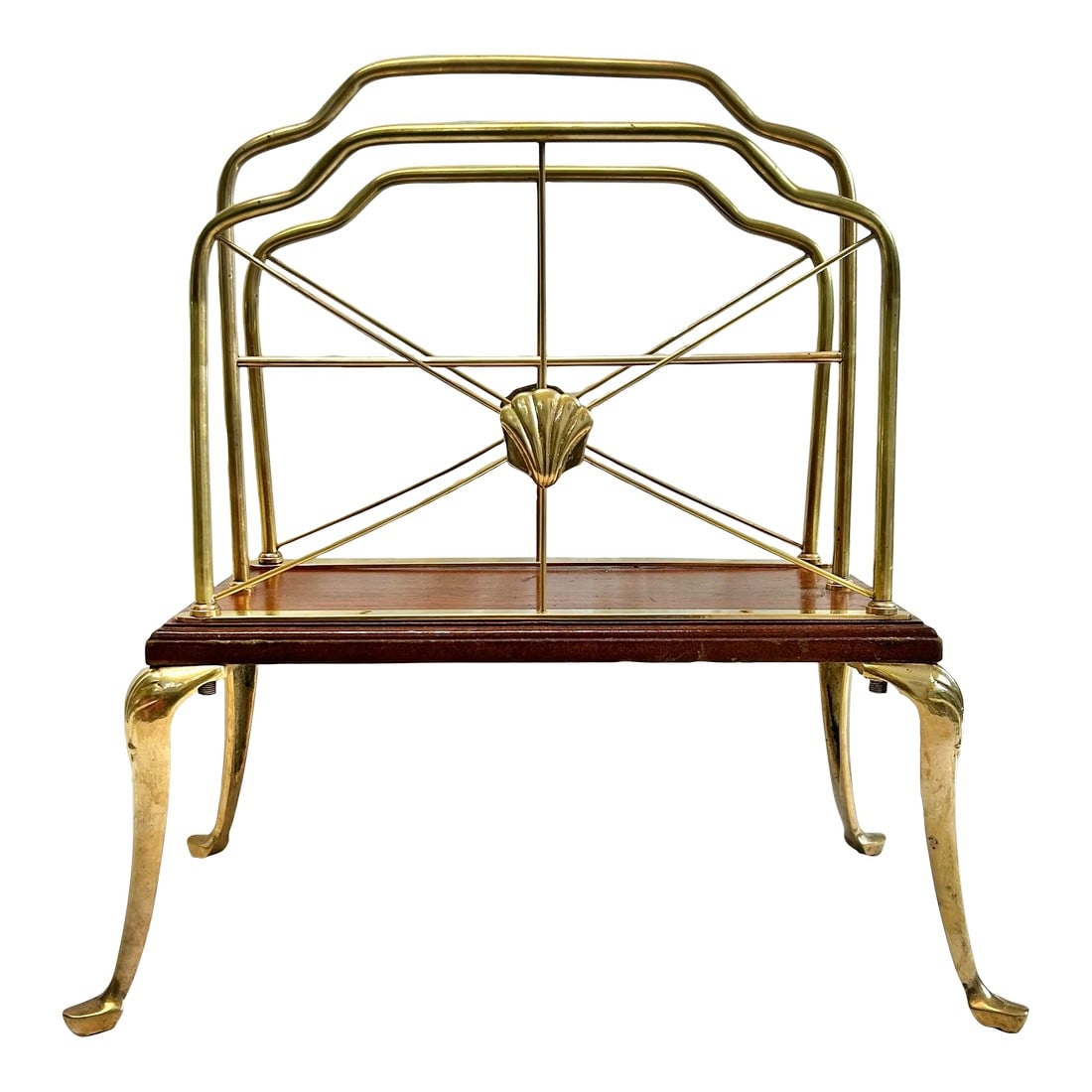 Mid 20th Century Hollywood Regency Brass Scallop Art Nouveau Magazine Rack: A gorgeous vintage brass magazine rack with beautiful lines and detail. It is a stunning piece. Dimensions: 19" tall 18.25" wide (at feet) 15" wide (wood platform) 9.75" deep (at feet) 7.75" (wood