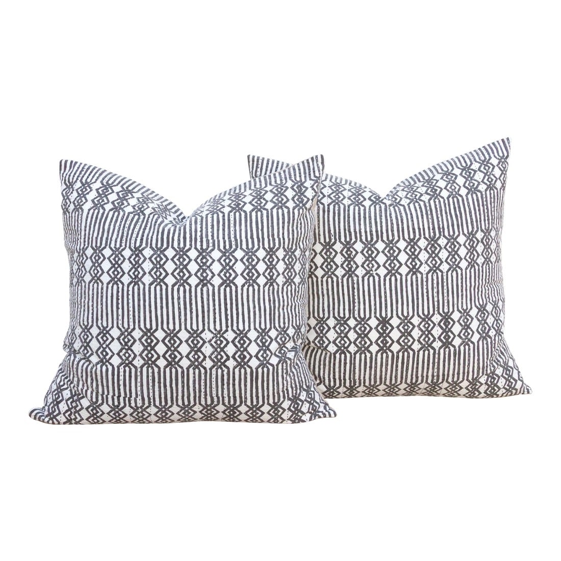 Pair of Large Black & White Blockprint Kantha Pillow: This magnificent pair of decorative pillows is a celebration of dual textile artistry. Each large 24-inch square pillow is crafted from genuine Kantha textile, a prestigious cloth from India renowned
