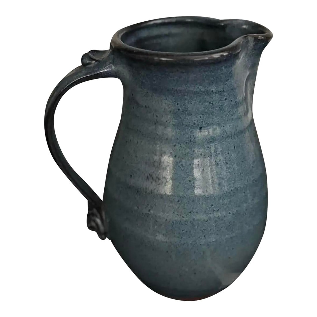 Late 20th Century, Blue Glazed Hand-Thrown Stoneware, David Clement Clayworks: Wheel-thrown and signed "Clement" this exceptional studio pottery pitcher reflects the work of David Clement of Clement Clayworks (est. 1993). The soft variegated glaze moves from deep denim to