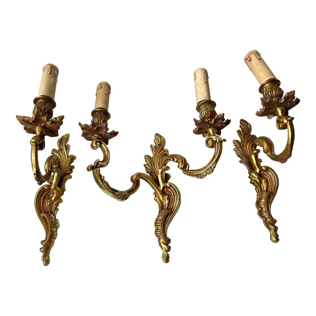 Mid 20th Century French Brass Acanthus Leaf Double Arm Single Arm Pair 3 Piece Sconce Set: This is a fine quality classic rococo style three piece set of brass sconces consisting of a pair of single arm sconces and a single double arm sconce. The back plate has an acanthus leaf design and