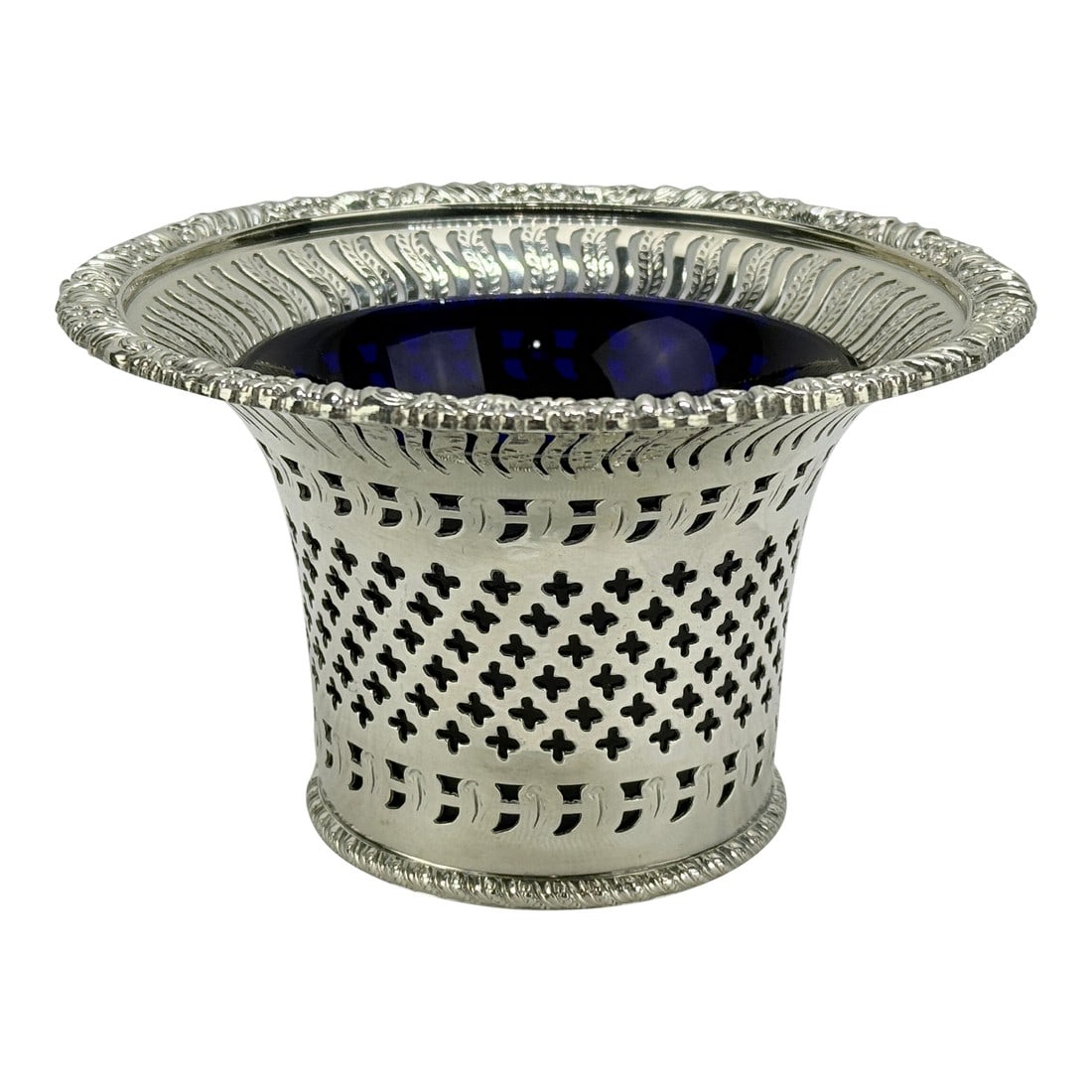 Mid 20th Century English Barker Ellis Silverplate Openwork & Cobalt Glass Lined Vessel: This English silverplate openwork vessel, marked for Barker Ellis of Birmingham, displays the firm's characteristic precision in pierced metalwork and ornamental borders, combining functional