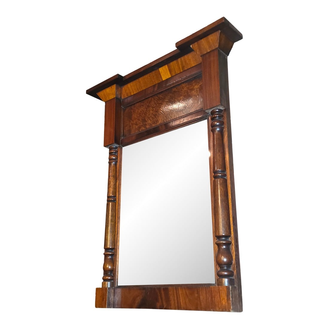 Antique Mahogany Mirror: Beautiful figured mahogany antique mirror circa 1820. Natural aging to the mercury backing on the glass. Condition: Alterations: Original Condition Unaltered Imperfections: Some Imperfections Conditio