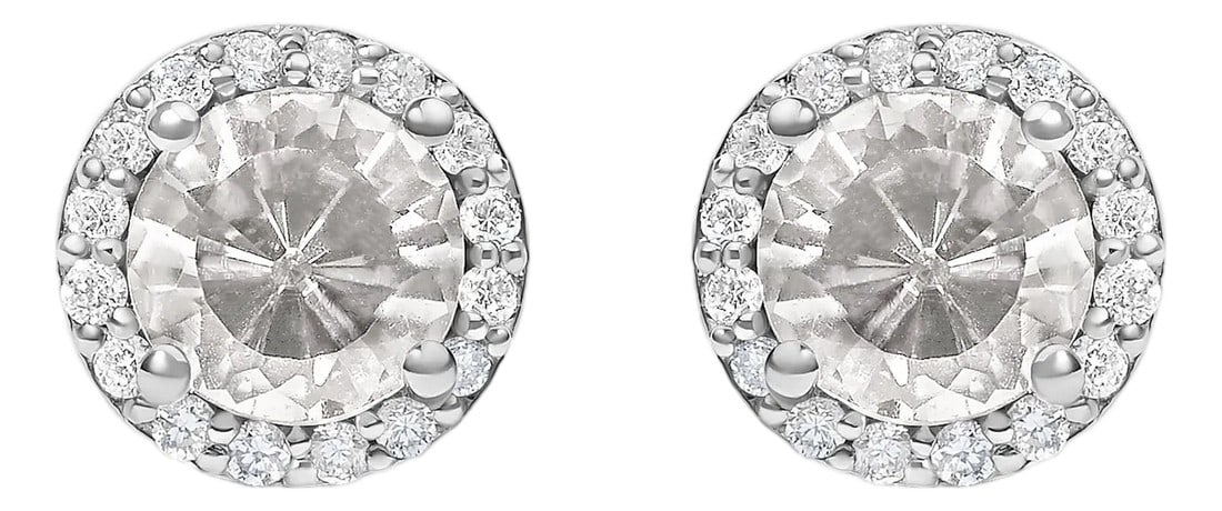 10K White Gold White Topaz and 1/6 Cttw Diamond Halo Stud Earring: Immerse yourself in the allure of these exquisite 10K white gold stud earrings, each centered with a captivating 5mm natural white topaz, treated to deepen its allure. This gemstone, embraced by four