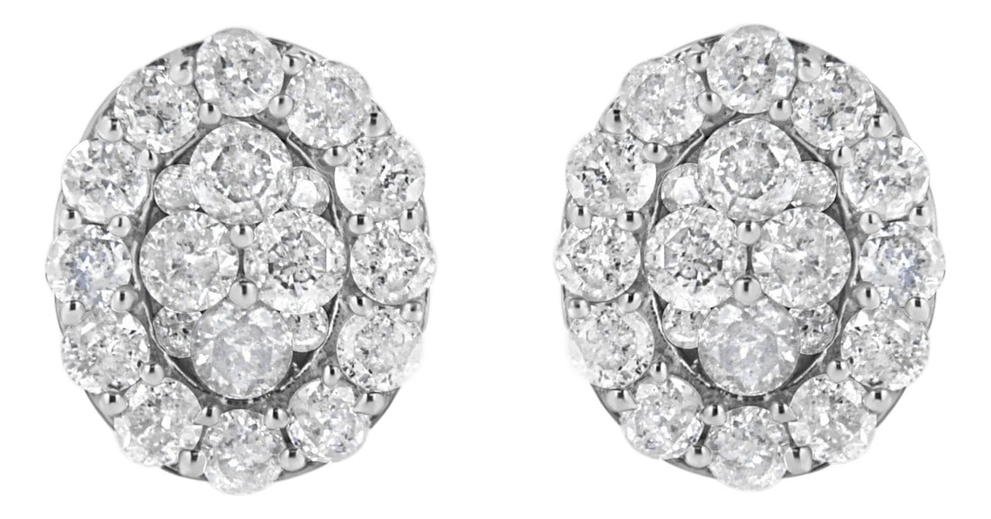 .925 Sterling Silver 1 1/2 Cttw Round-Cut Diamond Oval Shaped Stud Earrings, A Pair: These glamorous earrings are set with a dazzling total diamond weight of 1 1/2 cttw. Designed in an ovular manner, these earrings are set with 40 round-cut diamonds in an elegant prong setting. The ov