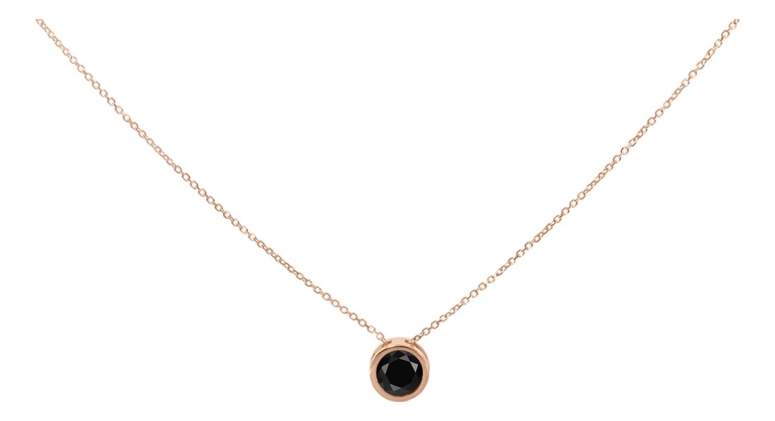 14K Rose Gold 4.0 Cttw Bezel-Set Black Round Diamond Solitaire Pendant Necklace (Black Color, I2-I3: Immerse yourself in the opulence of sophistication with this exquisite necklace, where a 4 carat treated black diamond, of natural origin, takes center stage. Its deep, opaque hue, enriched through