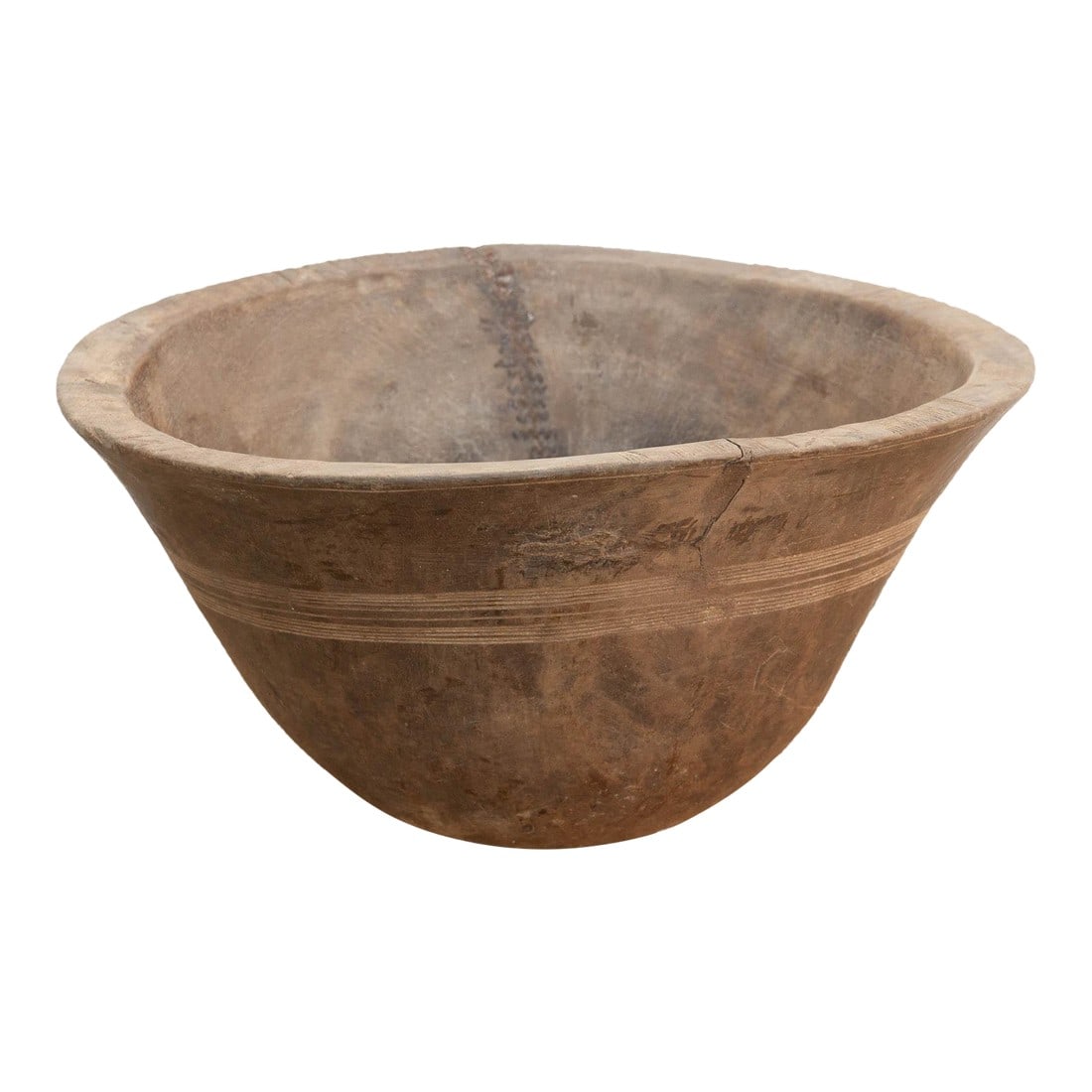 Antique Mended Dough Bowl From Africa: There is something deeply grounding about holding a vessel that was hewn by hand from a single block of wood. This antique African bowl is a stunning example of utilitarian art. Unlike mass-produced