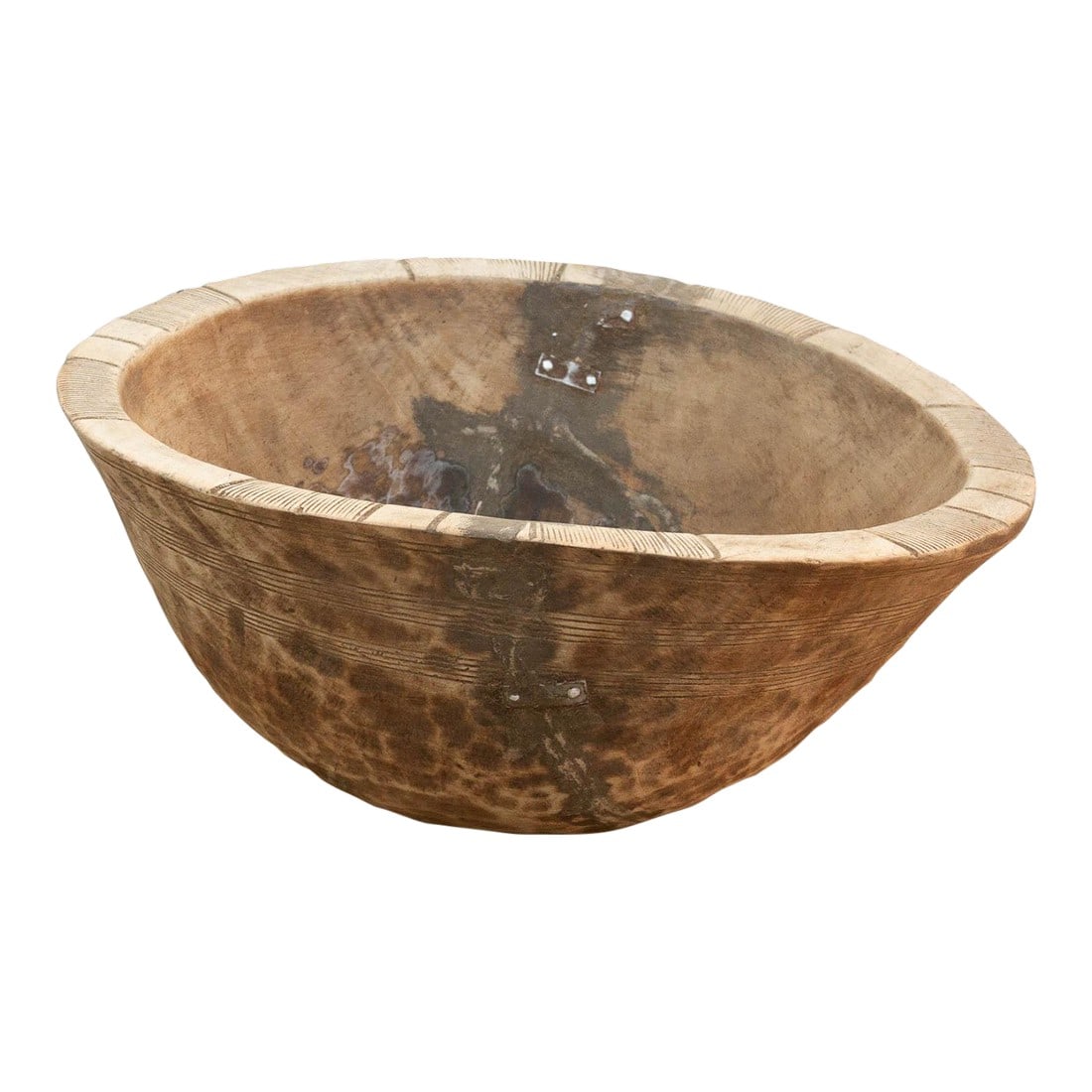 Metal Strapped African Dough Bowl: There is something deeply grounding about holding a vessel that was hewn by hand from a single block of wood. This antique African bowl is a stunning example of utilitarian art. Unlike mass-produced