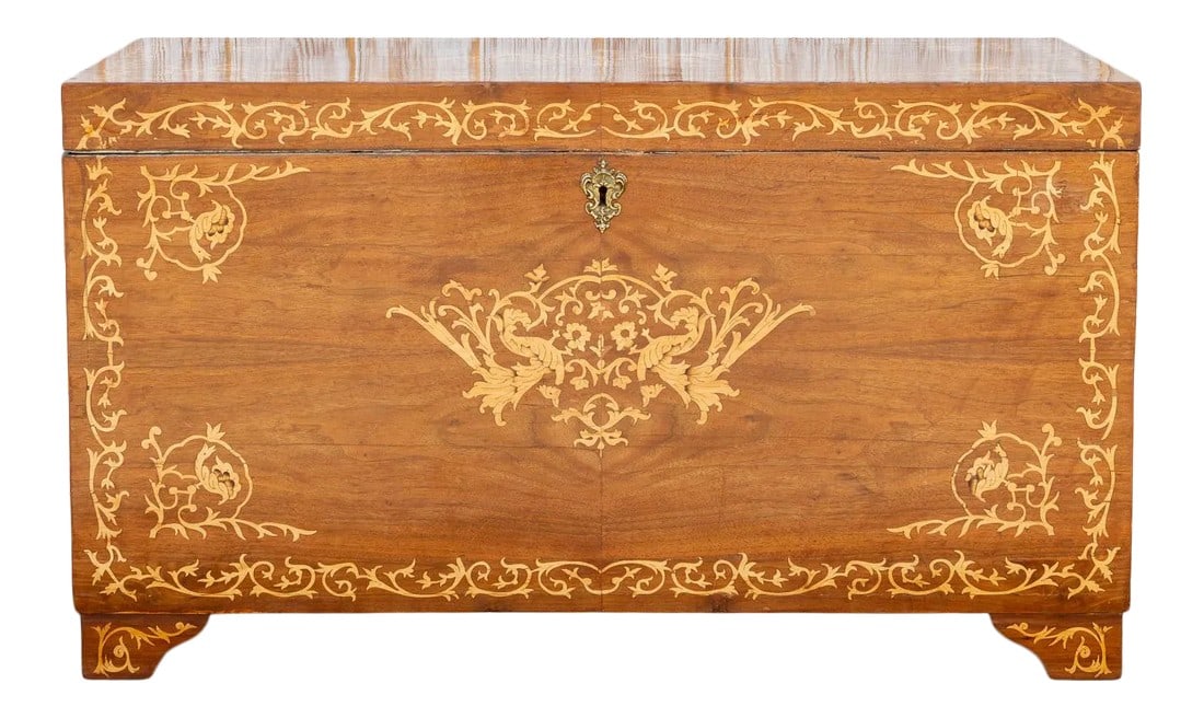 Large Walnut Marquetry Inlay Chest: A vintage oversized inlay Dutch colonial trunk with large ornate gilded handles. This large walnut veneered chest features a delicate marquetry decorative work with ivy and foliage motifs. This Chest