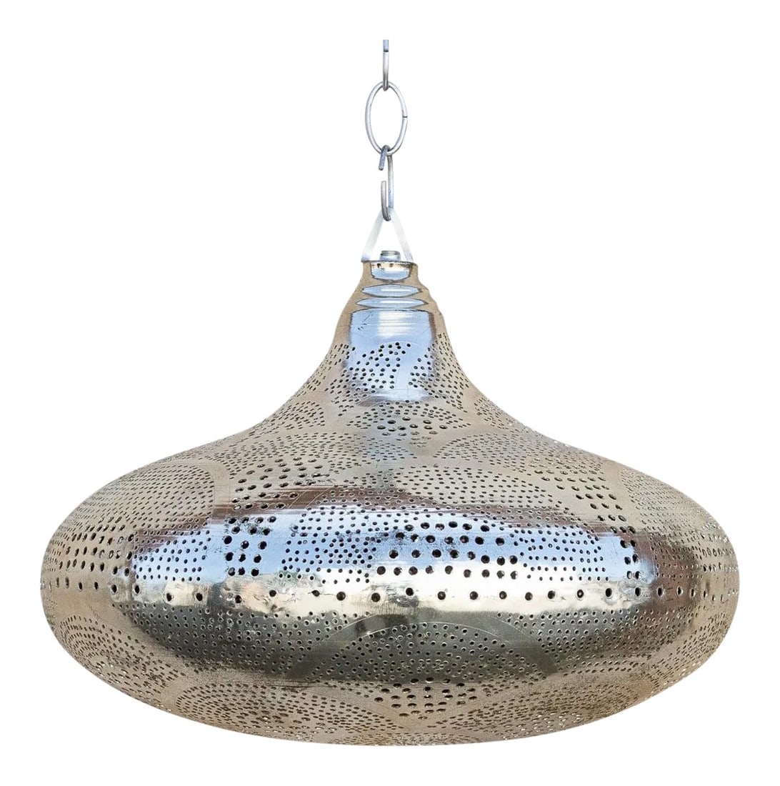 Girih Moorish Sphere Pendant Lantern: A delicately perforated Moorish pendant lantern. This pendant features pierced foliate see-through work which is all done by hand. When wired for light this lantern features open lattice geometric wor