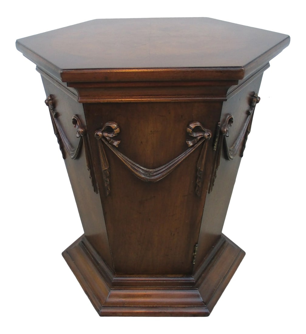 Vintage Burl Wood Top Side Table With Ribbon and Bow Motif: This stylish hexagon side table has a banded burlwood top and ribbon and bow wooden appliques one each of the tapered sides. The door is on a pressure latch; you push on the door and it pops open. The