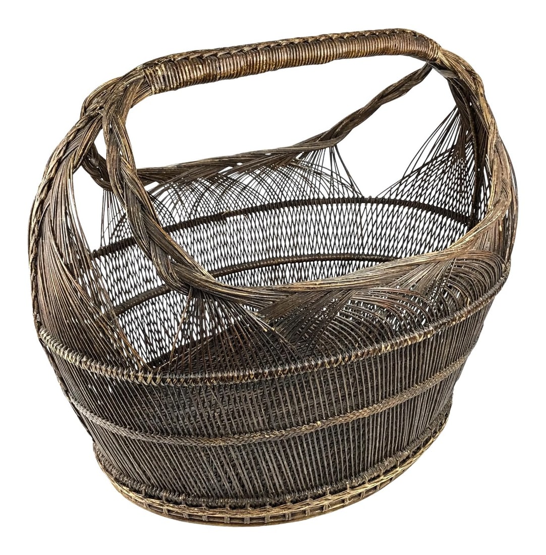 1950s Extra Large Japanese Artisan Hand Woven Basket: This extra large basket was acquired from an auction house in Hong Kong during the 80s. Unfortunately all paperwork has been long gone. Just look at the intricate details and weaving patterns. Probabl