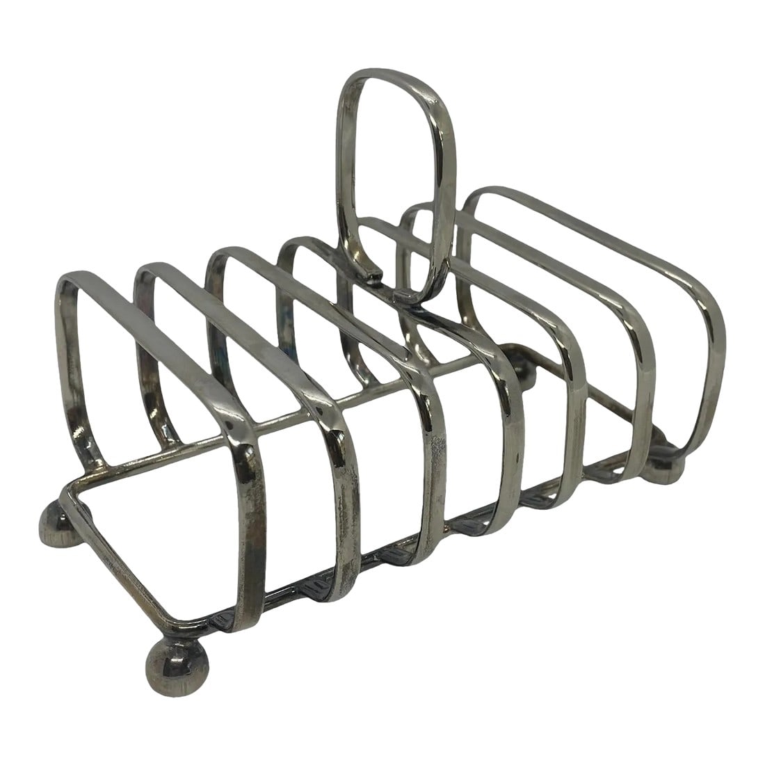 Mid 20th Century Silver Plate Toast Rack: Mid 20th Century Silver Plate Toast Rack. This lovely Rack is in excellent condition with minor scratches as a result of age and normal use. There is a Maker's Mark but it is very difficult to read as