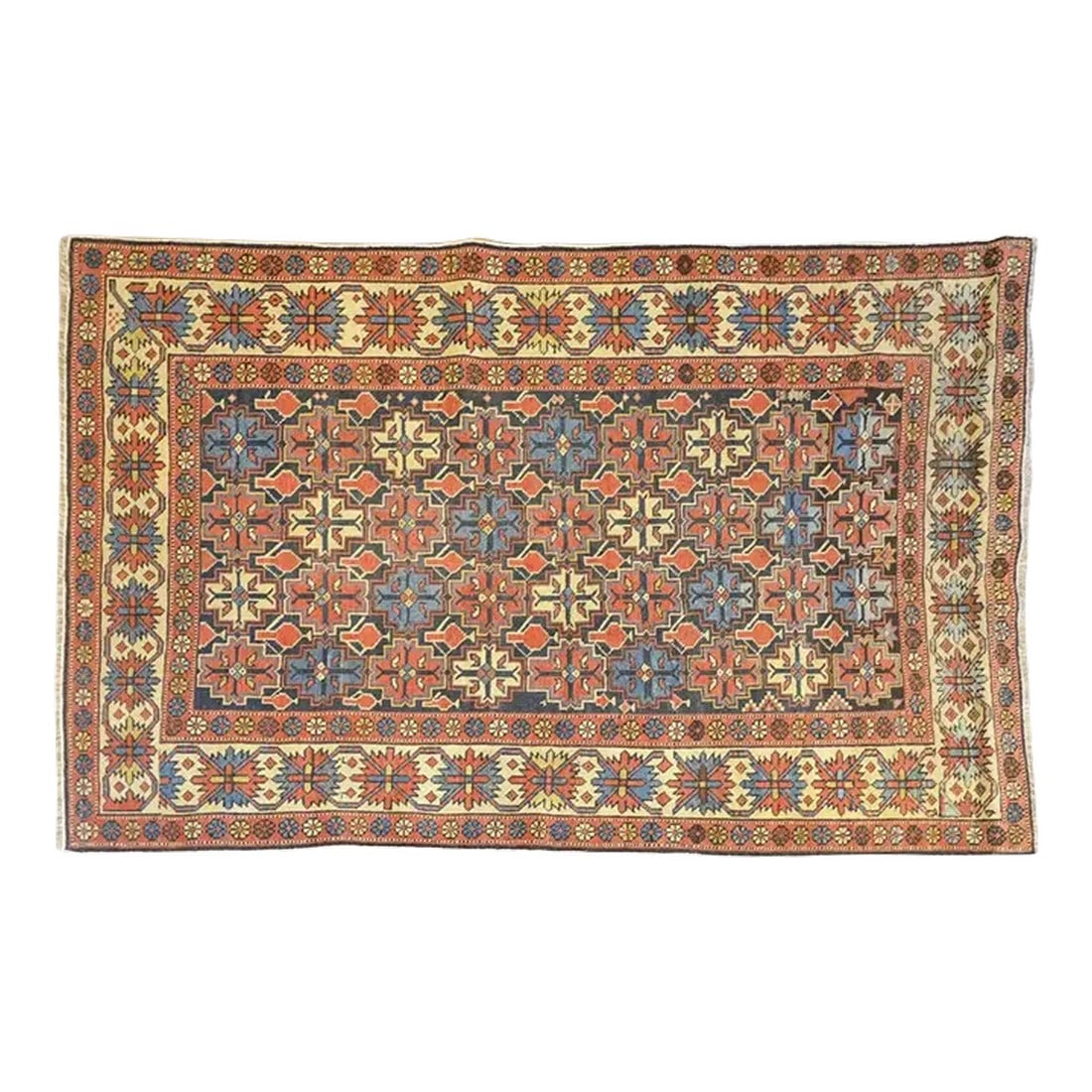 19th Century Shrivan Rug: An amazing late 19th century Persian Shrivan rug with an incredible all-over geometric stylized floral pattern woven in crimson, indigo and natural wool, on a dark indigo field. The border is