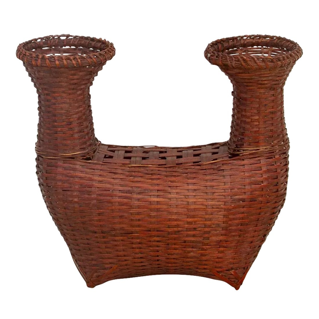 Vintage Asian Boat Shaped Basket: This antique woven basket from Thailand has a boat shape with a rounded body and two narrow neck openings. This old Thai wicker container has a brown umbar stained finish. **Please bear in mind that c