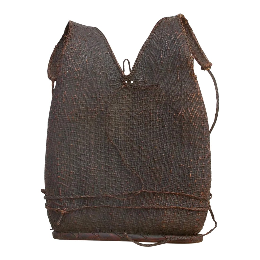 Rare Tribal Naga Antique Bag: Found in the villages around Nagaland, an indigenous territory on the border of India and Myanmar. This unusual school bag is finely woven and has its original carrying rope straps. The antique Naga r