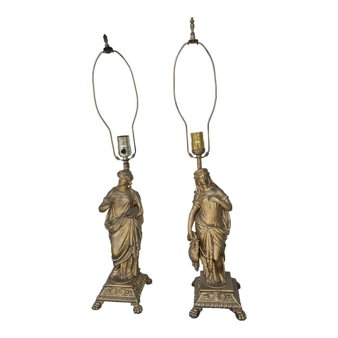 1950s Gold Grecian Ladies Lamps - a Pair: Beautiful metal lamps in the shape of woman. Measuring 18" to top of socket 29" to top of finial. 5.5" x 5.5"square base with claw feet. Condition: Alterations: Original Condition Unaltered