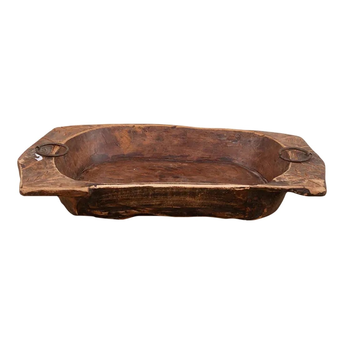 Large Oval Swat Valley Bowl: An old oval shape wood bowl originally used for kneading dough. Found in the Swat Valley. This antique dough bowl was made from a single log of wood. This rustic bowl has two shaped carrying handles w