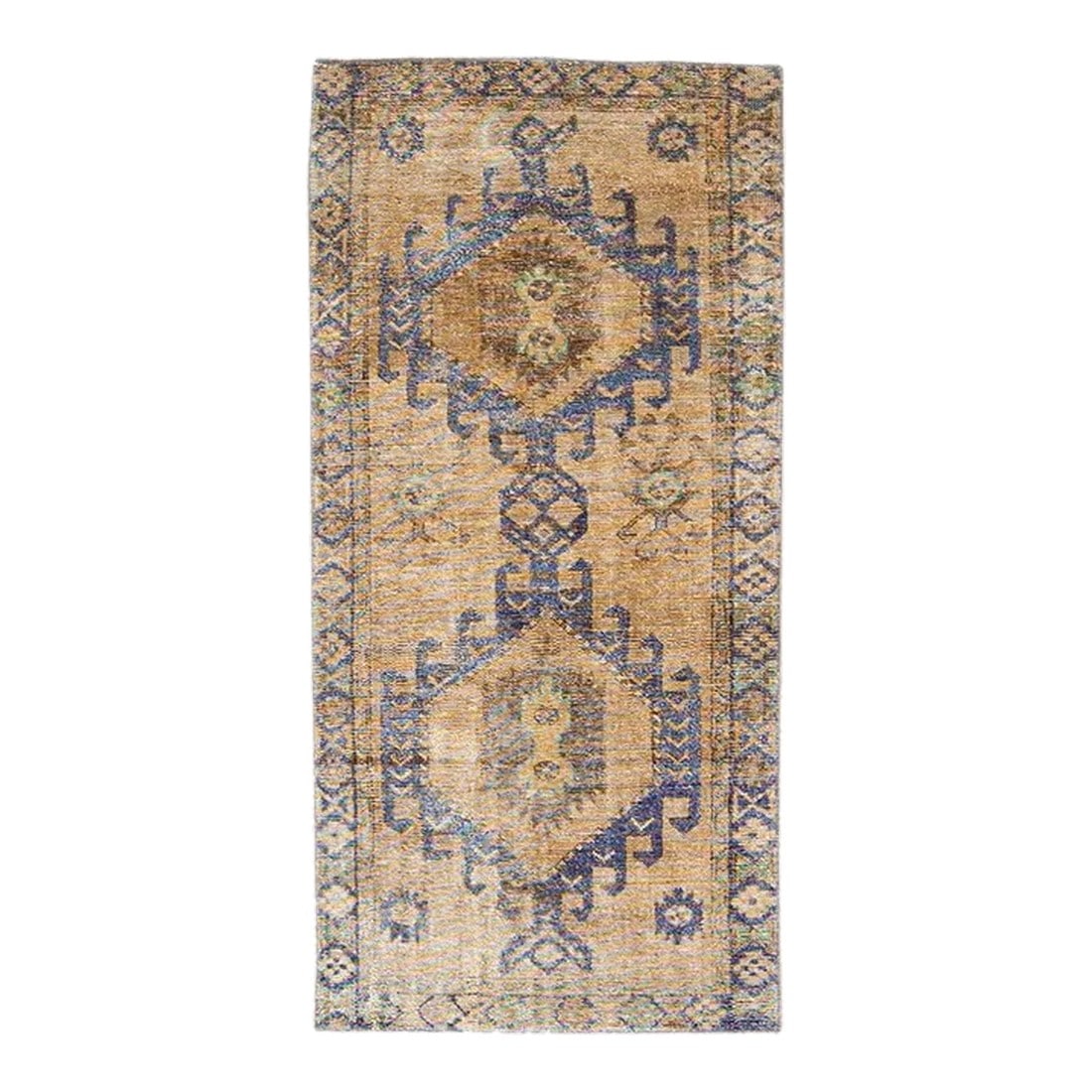 1960s Vintage Persian Distressed Handmade Medallion Tan Wool Runner: Beautiful vintage Persian distressed hand-knotted wool runner with a tan color field. This rug has a beige frame and multicolor accents in an all-over geometric medallion design. This rug measures: