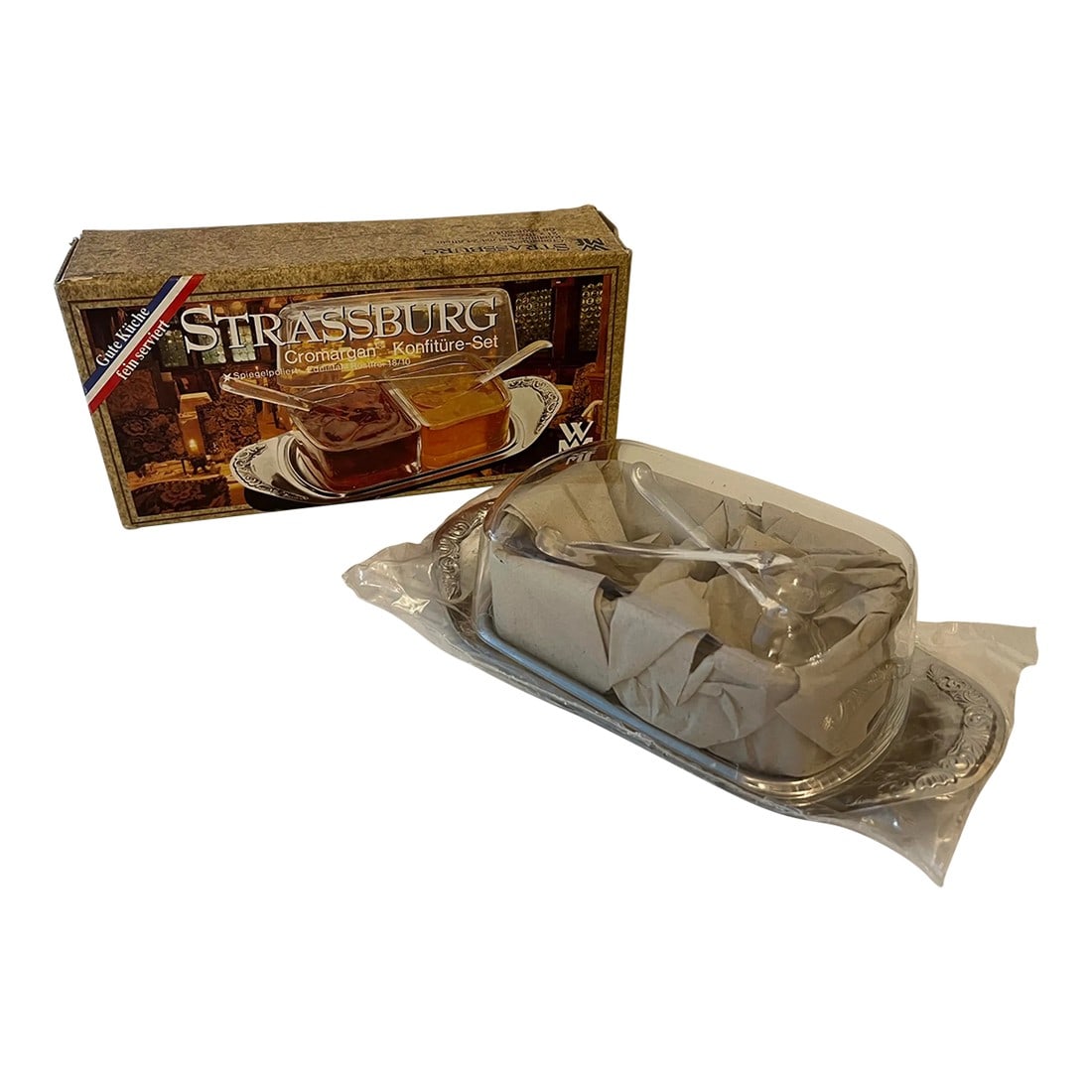 1960s Condiment or Jam Serving Set by Strassburg- 3 Pieces: New in Box and never used . Cute serving set for condiments or jams . It has 2 separate glass dishes that sit on a stainless steel tray, comes with 2 plastic serving spoons and 1 plastic lid that